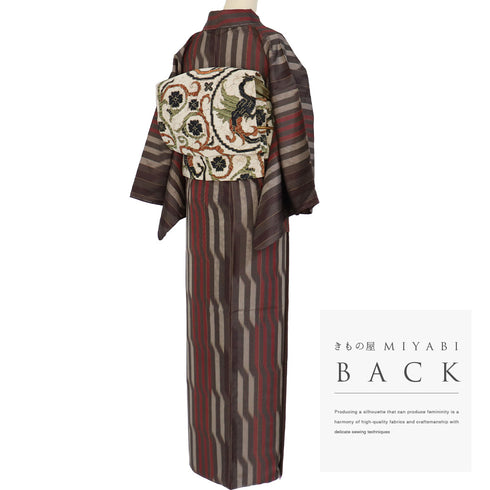 紬 リサイクル 身丈163cm 裄64.8cm 袷 お召 縞模様 唐草柄 地紋 ブラウン Lサイズ お洒落 カジュアル しつけ糸 不明 広衿 Sランク