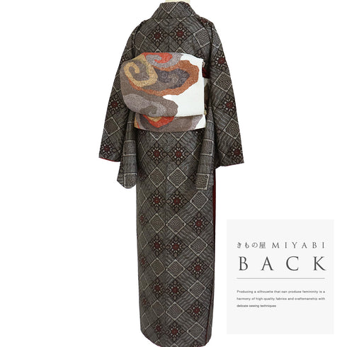 紬 リサイクル 身丈157cm 裄66.8cm 袷 大島紬 龍郷柄 ブラウン Mサイズ カジュアル 正絹 バチ衿 Sランク