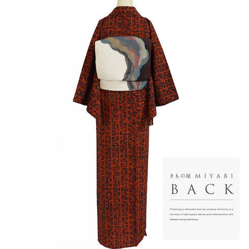 小紋 リサイクル 身丈158.3cm 裄62.8cm 単衣 いろは歌柄 オレンジ Mサイズ お洒落 しつけ糸 正絹 広衿 Sランク