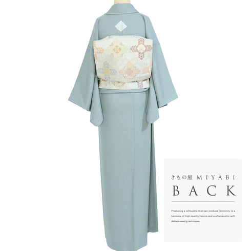 色無地 リサイクル 身丈156.4cm 裄62.7cm 袷 作家物 瑞寶 グリーン Mサイズ セミフォーマル 落款 一つ紋 しつけ糸 正絹 広衿 地紋あり Sランク