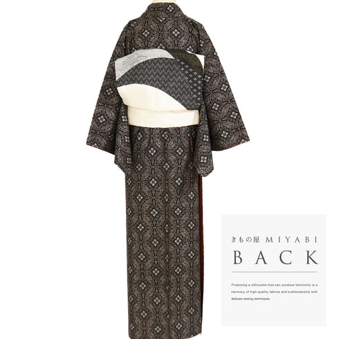 紬 リサイクル 身丈156.5cm 裄64.8cm 袷 デザイン七宝柄 ブラウン Mサイズ カジュアル お洒落 しつけ糸 正絹 広衿 Bランク