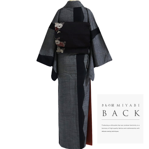 紬 リサイクル 身丈162cm 裄65cm 袷 幾何学模様 織り出し柄 ブラック Lサイズ お洒落 カジュアル 正絹 広衿 Sランク