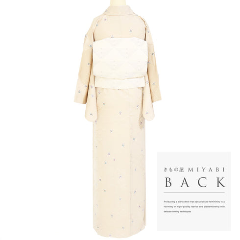 小紋 リサイクル 身丈156.5cm 裄63.8cm 袷 デザイン青海波に唐子人形柄 地紋 ベージュ Mサイズ お洒落 正絹 広衿 Sランク