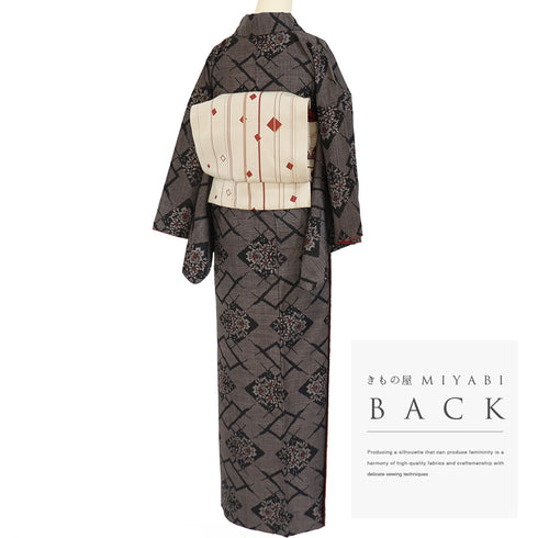 紬 リサイクル 身丈163cm 裄65.4cm 袷 菱に花柄 ブラウン Lサイズ カジュアル お洒落 正絹 広衿 Sランク