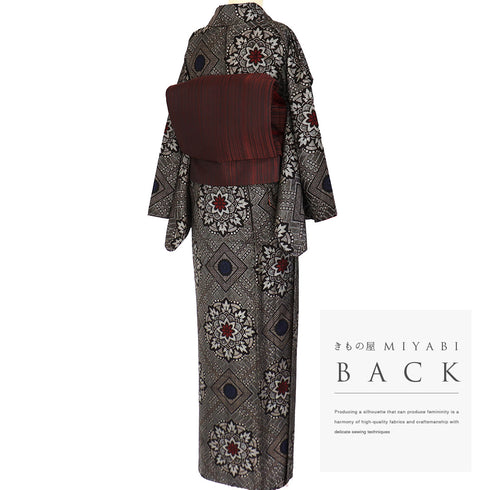 紬 リサイクル 身丈151.7cm 裄69cm 袷 龍郷 ブラウン Sサイズ お洒落 しつけ糸 正絹 広衿 Sランク