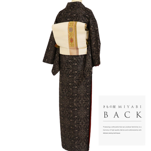 紬 リサイクル 身丈163cm 裄64.8cm 袷 葡萄唐草柄 ブラウン Lサイズ お洒落 カジュアル しつけ糸 正絹 広衿 Sランク