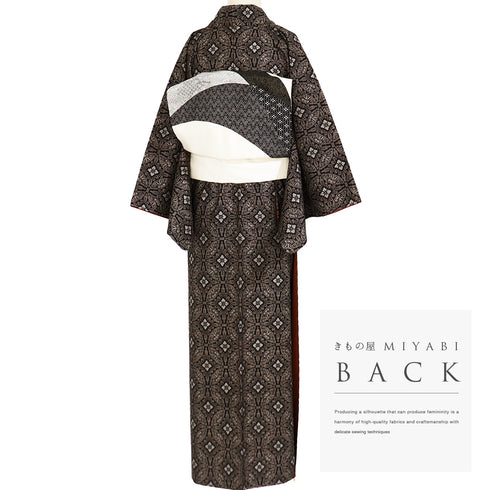 紬 リサイクル 身丈156.5cm 裄64.8cm 袷 デザイン七宝柄 ブラウン Mサイズ カジュアル お洒落 しつけ糸 正絹 広衿 Bランク