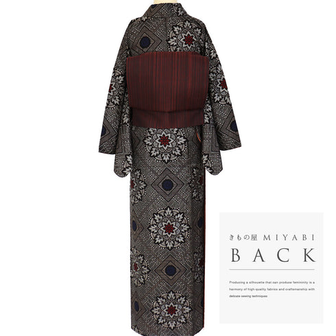 紬 リサイクル 身丈151.7cm 裄69cm 袷 龍郷 ブラウン Sサイズ お洒落 しつけ糸 正絹 広衿 Sランク