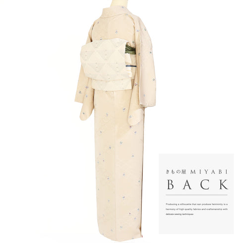 小紋 リサイクル 身丈156.5cm 裄63.8cm 袷 デザイン青海波に唐子人形柄 地紋 ベージュ Mサイズ お洒落 正絹 広衿 Sランク