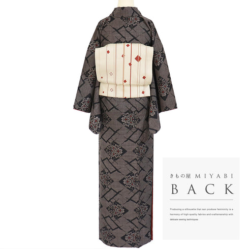 紬 リサイクル 身丈163cm 裄65.4cm 袷 菱に花柄 ブラウン Lサイズ カジュアル お洒落 正絹 広衿 Sランク