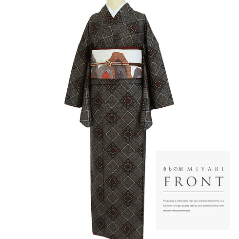 紬 リサイクル 身丈157cm 裄66.8cm 袷 大島紬 龍郷柄 ブラウン Mサイズ カジュアル 正絹 バチ衿 Sランク