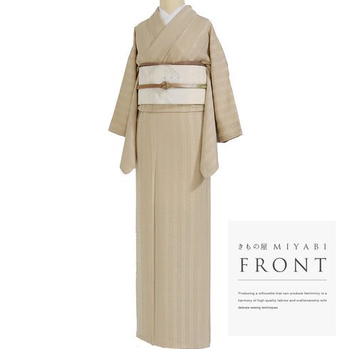 色無地 リサイクル 身丈160.2cm 裄62.8cm 袷 エジプト絵文字風の地紋柄 ベージュ Mサイズ セミフォーマル お洒落 一つ紋 正絹 広衿 地紋あり Sランク