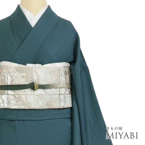 色無地 リサイクル 身丈162.8cm 裄67.2cm 袷 グリーン Lサイズ セミフォーマル お洒落 一つ紋 正絹 広衿 地紋あり Sランク